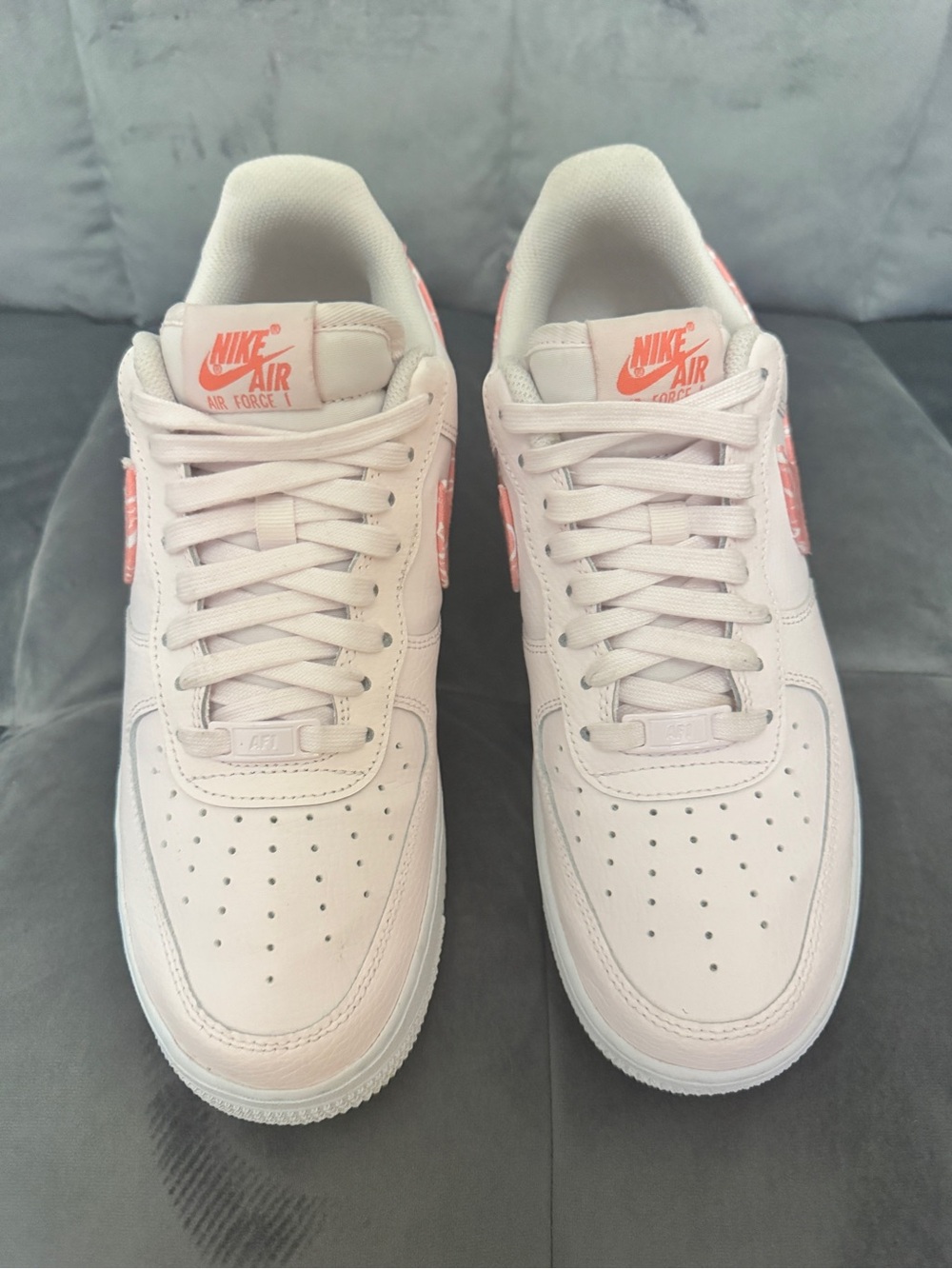 Nike Air Force 1 Low in Pale Pink with Coral Accents